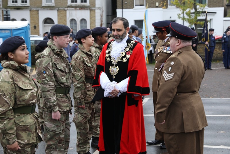 Cllr Tauseef Anwar with members of the army