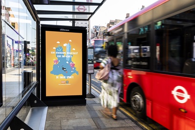 An image of the Love our Hearts campaign displayed on a bus stop. The text reads: Love Lewisham's Businesses? Love our hearts. Be sugar smart!