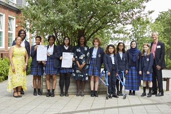 Cllr Chris Barnham and Deputy Mayor Brenda Dacres with pupils of Sydenham School and headteacher Gloria Lowe